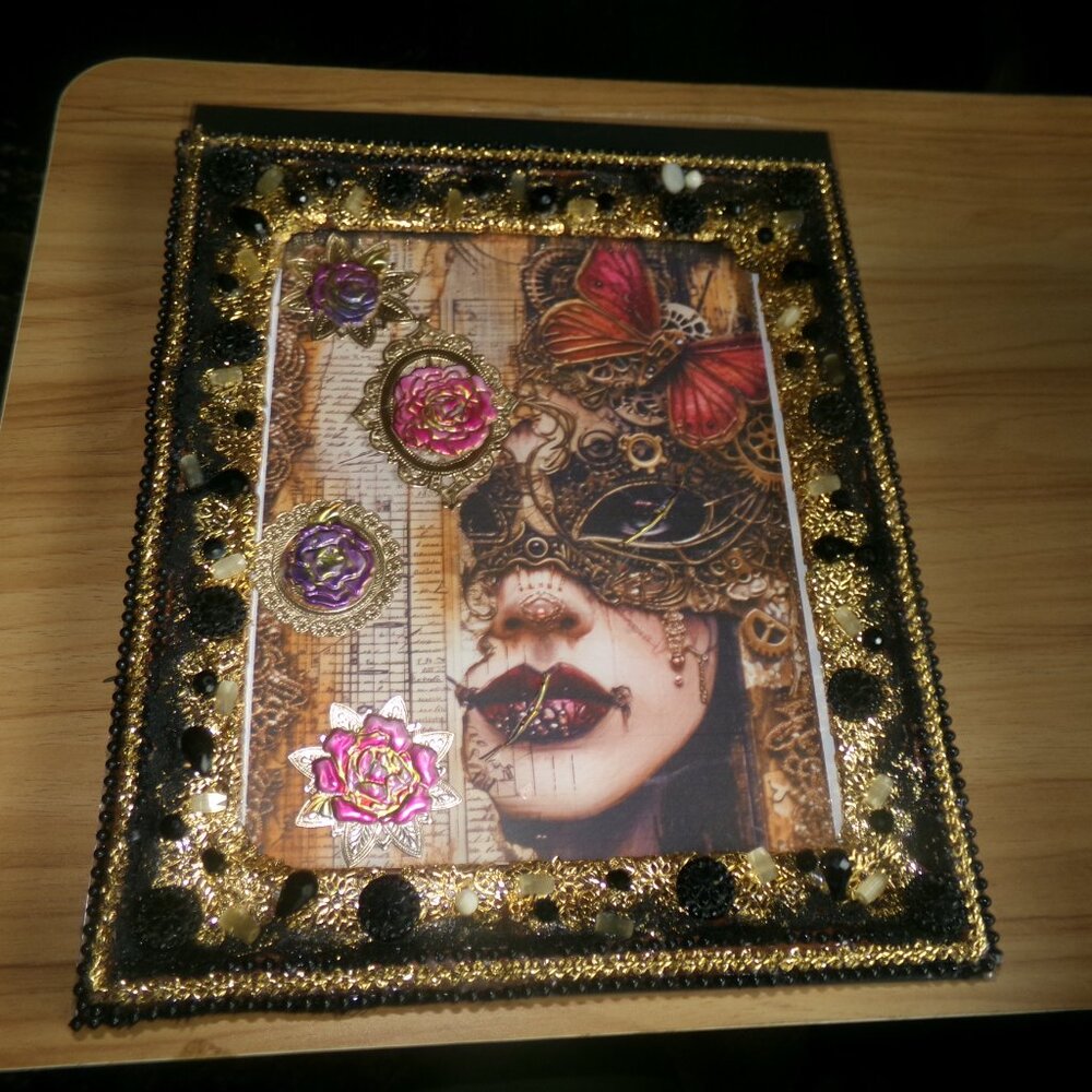 vintage glass buttons & beads hand crafted on a wood glassed frame.